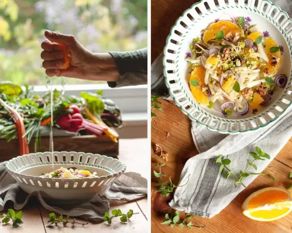 Frische Zutaten für eine insalata siciliana: Fenchel, Orange, rote Zwiebeln und Walnüsse werden in einer Schüssel angerichtet.